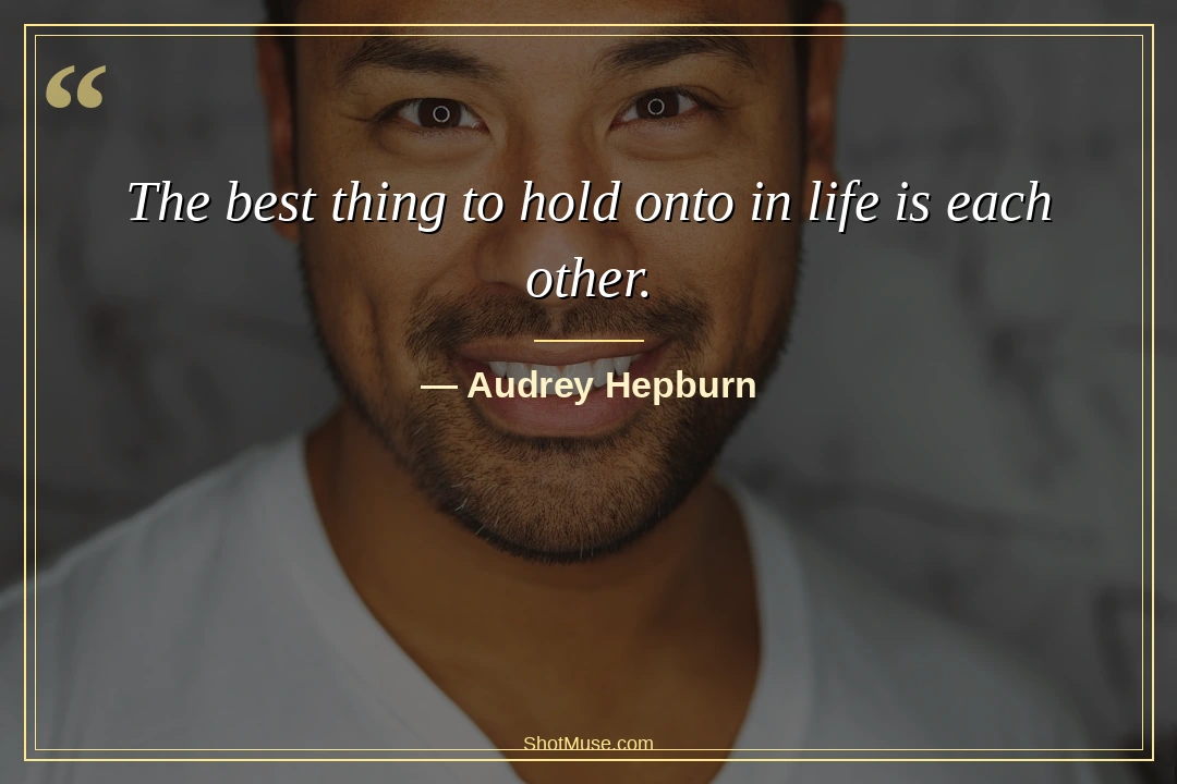 Couple quote by Audrey Hepburn — The best thing to hold onto in life is each other — warm golden portrait wallpaper