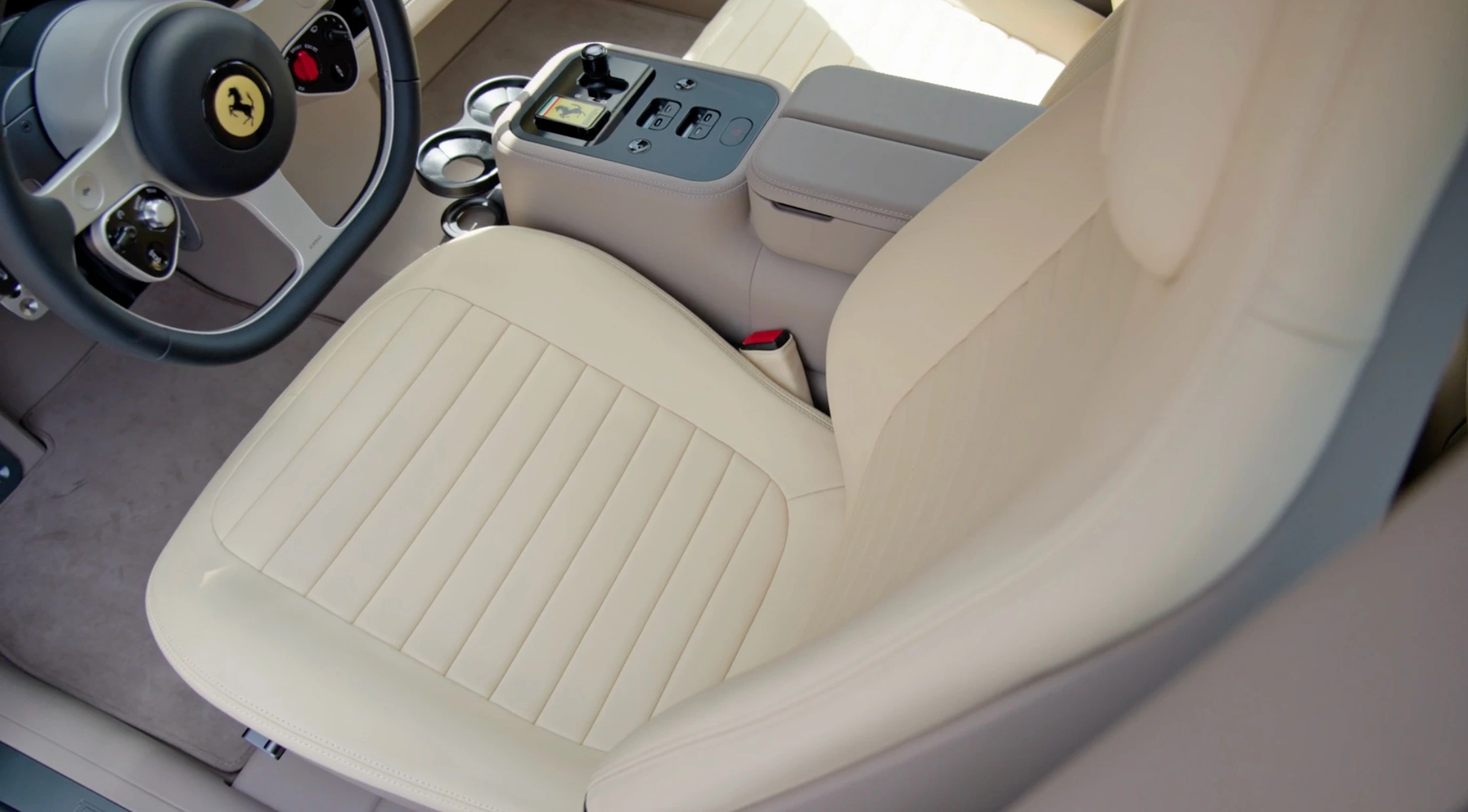 Ferrari Luce interior front seat HD photo — hand-stitched leather and carbon fibre