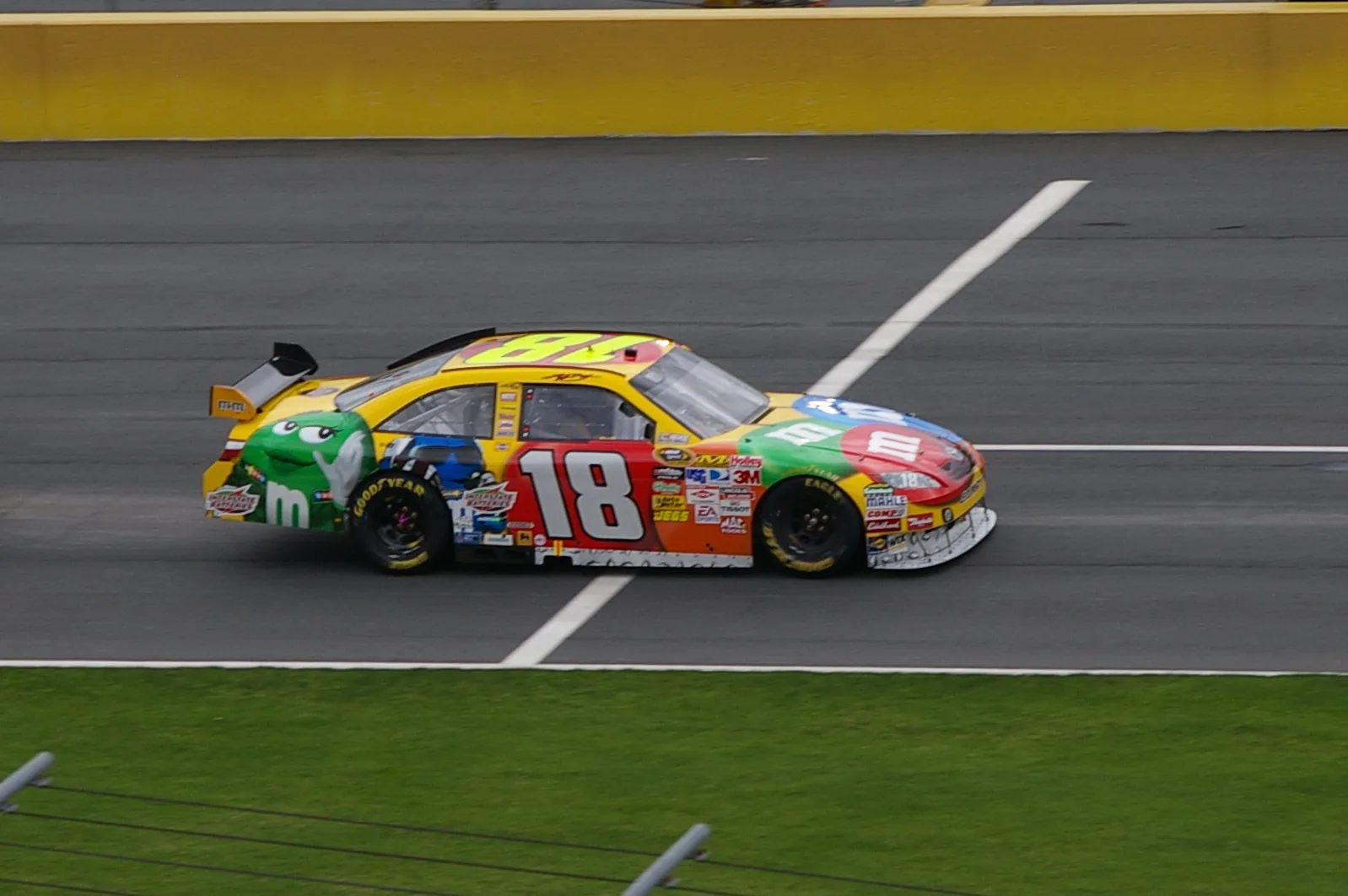 Kyle Busch in his early racing career, photographed before a race at the Milwaukee Mile — a glimpse of the future champion
