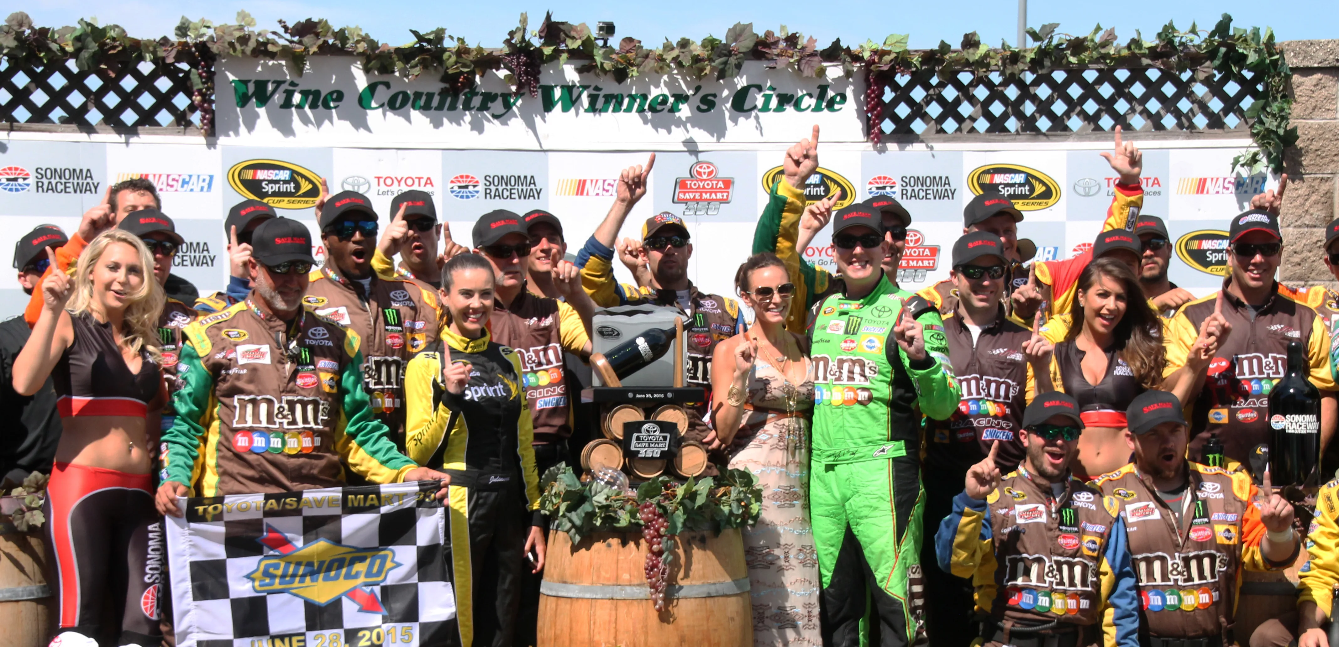 Kyle Busch celebrates his 2015 Toyota/Save Mart 350 victory at Sonoma Raceway, pumping his fist in celebration