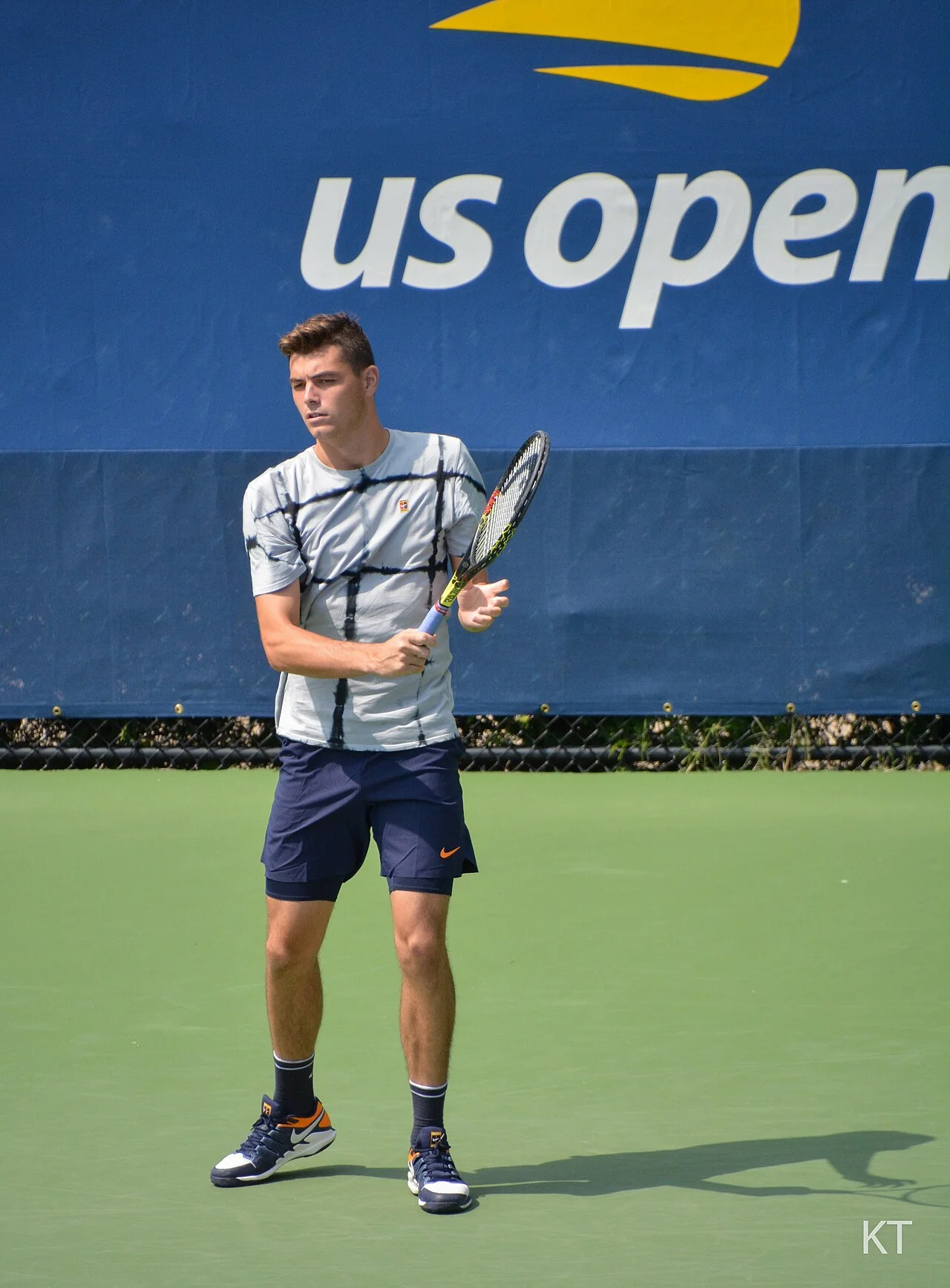 Taylor Fritz during a professional tennis match — his powerful baseline game on display